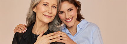two women, jewelry, rings, necklace, shirt